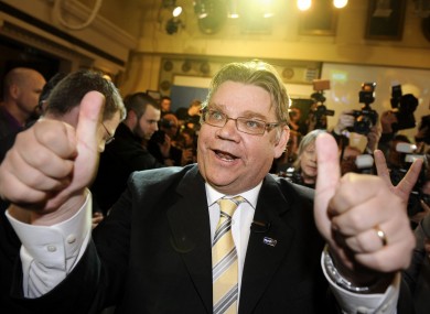 Timo Soini of the True Finns celebrates with supporters after his party recorded massive gains in the country's parliamentary elections.