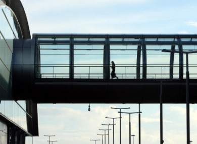 A passenger crosses a walkway at Dublin Airport - an average of 12 women a day are travelling from Ireland to England and Wales for abortions