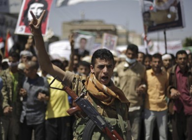 A defected Yemeni soldier chants slogans during a demonstration demanding the resignation of Yemen's president Ali Abdullah Saleh yesterday.