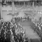 Hyde prepares to take his oath in St Patrick's Hall, Dublin Castle while the Army band look on from the Minstrel's Gallery, waiting to break into the National Anthem.