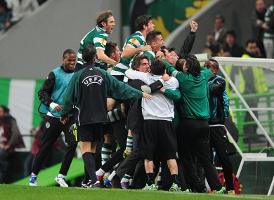The Sporting players celebrate Xandao's goal.