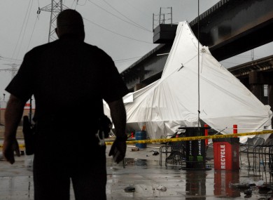 An officer from the Terminal Railroad Police Department surveys the damage.