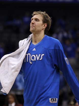 Dallas Mavericks forward Dirk Nowitzki of Germany walks off the court following Game 3.