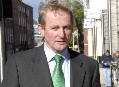 Enda Kenny, pictured here outside Leinster House on the day after the Fianna Fáil-led government said it would be guaranteeing the country's banks.