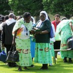 Pilgrims Sindisiwe Makamure (left) and Rita Charakupa from Zimbabwe take a look at today's programme of events

Laura Hutton/Photocall Ireland