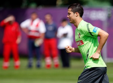 Team captain Cristiano Ronaldo is out through his paces during a Portugal training session.