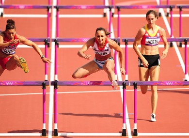 Jessica Ennis, centre, on her way to winning heat 5 of the Women's Heptathlon 100m Hurdles.