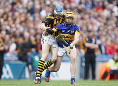 Tipperary's Padraic Maher and TJ Reid of Kilkenny battle for possession.