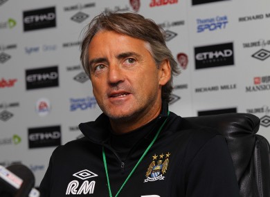 Manchester City manager Roberto Mancini could be headed for conflict with his Argentinian counterpart over Sergio Aguero.