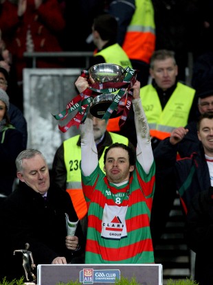 Brian Óg Maguire lifts the trophy after Lisnaskea Emmets' win in the All-Ireland IFC Club Final in 2011.