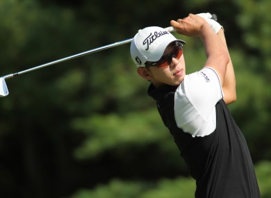 Seung-Yul Noh, from South Korea, hits his tee shot on the 11th hole during the first round of the Deutsche Bank Championship.