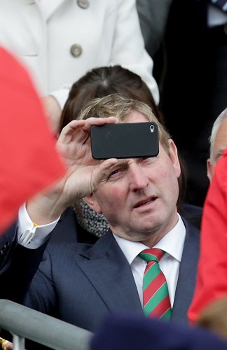 Enda Kenny records the scene on his phone 23/9/2012