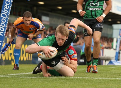 Eoin Griffin goes over for a try against the Scarlets.