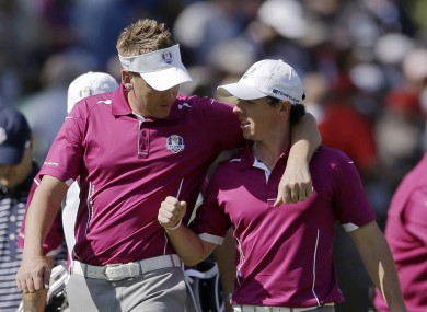 Europe's Ian Poulter and Rory McIlroy last night.