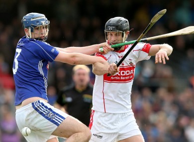 Dungarvan's Derek Barry and Jack Kennedy of De La Salle clash in last Sunday's Waterford Senior Hurling Final.