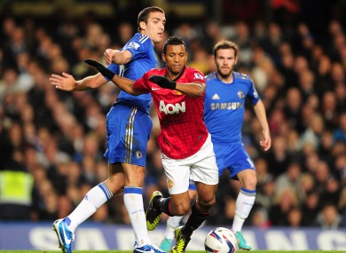 Manchester United's Luis Nani (centre) is fouled by Chelsea's Oriol Romeu (left).