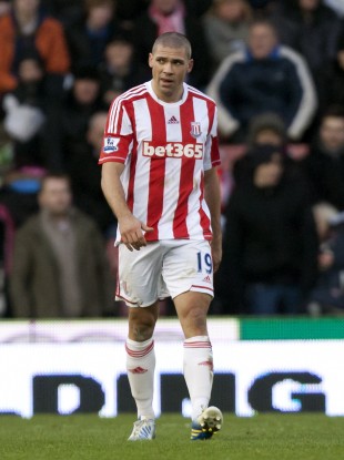 Stoke City's Jonathan Walters reacts after scoring an own goal during his team's English Premier League soccer match against Chelsea at the Britannia Stadium.