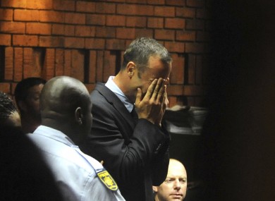 Athlete Oscar Pistorius weeps in court in Pretoria, South Africa.