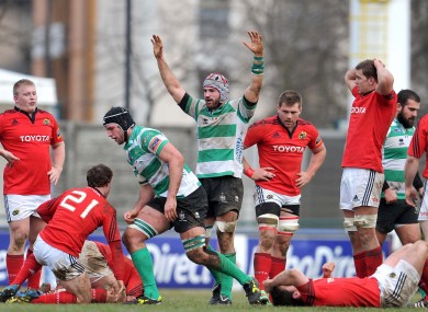 Treviso players celebrate at the final whistle.