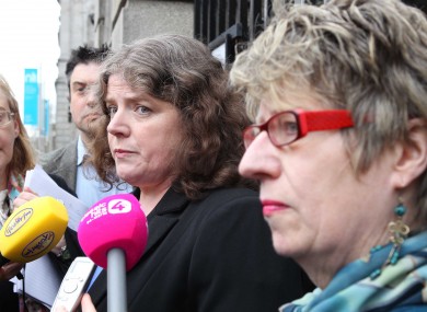 Dr Bernie McCabe, centre, outside Leinster House yesterday when details of 113 psychiatrists' concerns about abortion law were explained to politicians.