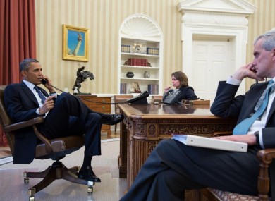 President Obama talks on the phone with FBI Director Mueller to receive an update on the explosions.