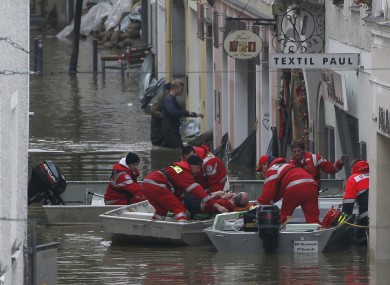 Red Cross teams evacuate businesses in the German town of Passau
