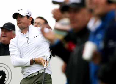 Rory McIlroy watches his ball get smaller in the distance from the sixth hole tee box.