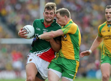 Aidan O'Shea of Mayo with Anthony Thompson of Donegal.