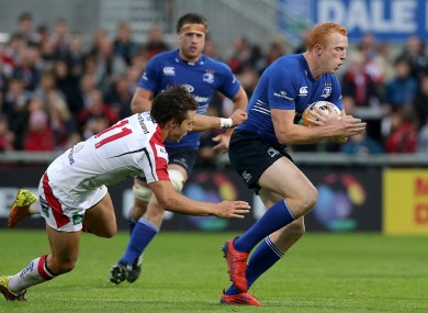 Ulster's Michael Allen grasps for Darragh Fanning of Leinster.