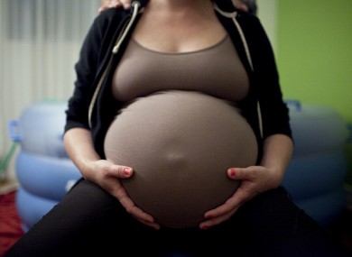 Woman having a home birth
