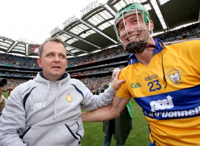 Clare manager Davy Fitzgerald celebrates with Fergal Lynch at the final whistle.