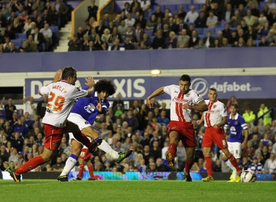 Everton's Marouane Fellaini scores his team's second goal of the game.