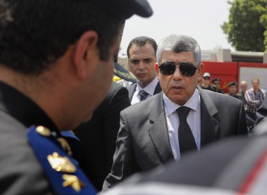 Egyptian Interior Minister Mohammed Ibrahim, right,