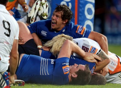 Mike McCarthy celebrates Jack McGrath's second-half try.