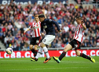 Wayne Rooney has a shot saved by Keiren Westwood.