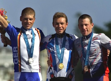 Russia's Viacheslav Ekimov, centre, winner of the gold medal in the men's individual time trial, with silver medal winner Jan Ullrich and Lance Armstrong.