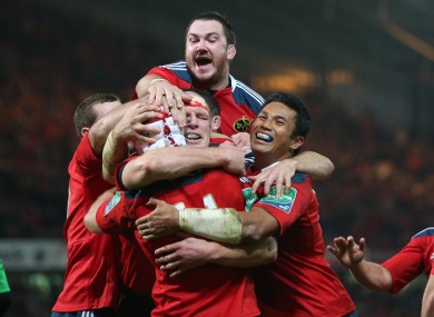 Munster celebrate Johne Murphy's try in the second half.